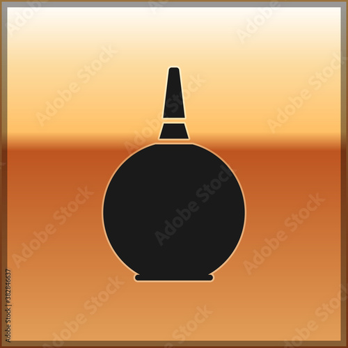 Black Enema icon isolated on gold background. Enema with a plastic tip. Medical pear. Vector Illustration.