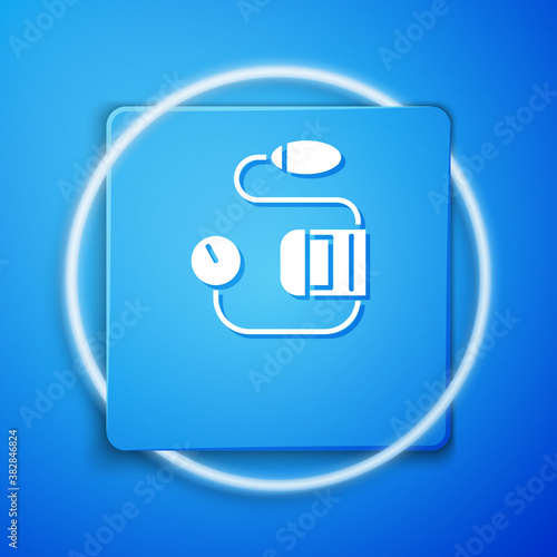White Blood pressure icon isolated on blue background. Blue square button. Vector Illustration.