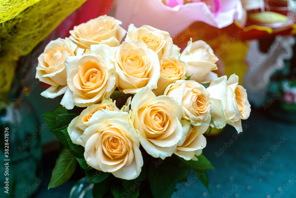 A bouquet of beige roses close-up

