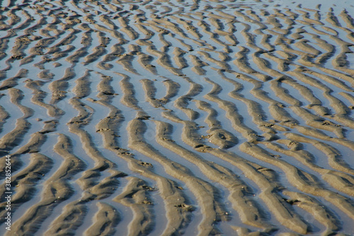 structures of sand and water at beach