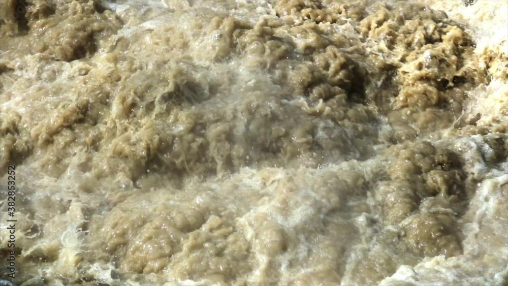 Slow motion close-up of boiling hot water in hot spring. Slow motion close-up of boiling hot water in hot spring.