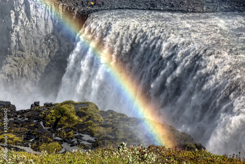 Dettifoss waterfall with late-afternoon rainbow