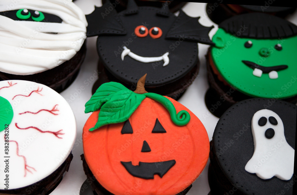 Funny Halloween sweet set treats cupcakes decorated sugar paste.