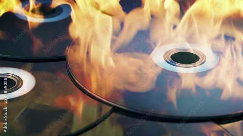 Blu Ray Discs In Flames - Burning Data Concept Blu Ray Discs In Flames - Burning Data Concept