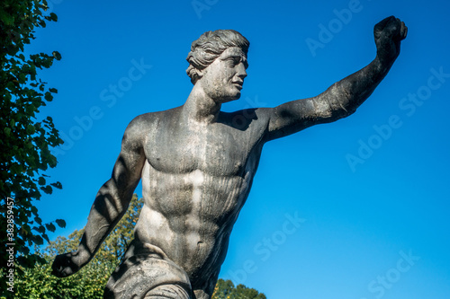 statue of an athlete in the park