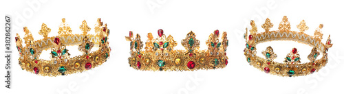 Beautiful crown with gemstones on white background, views from different sides
