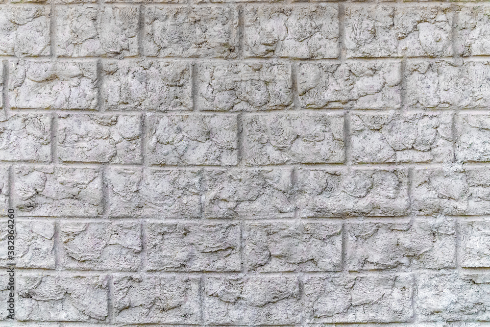 Decorative stone wall. Gray brick wall background