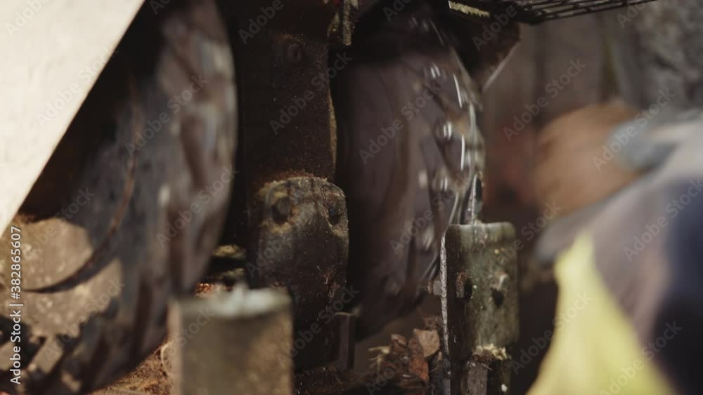 Close shot of coconut shell peeling inside coconut factory Close shot of coconut shell peeling inside coconut factory