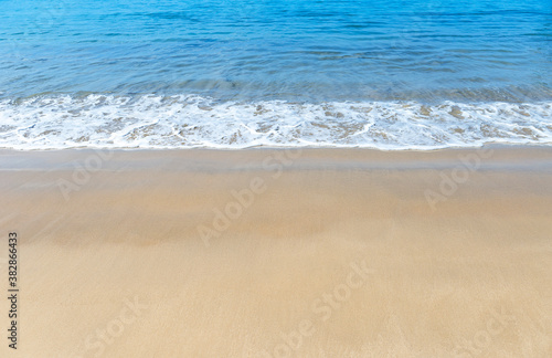 Beautiful clean beach on Phuket island in Thailand, white clean sea wave on clear sand beach, summer outdoor day light