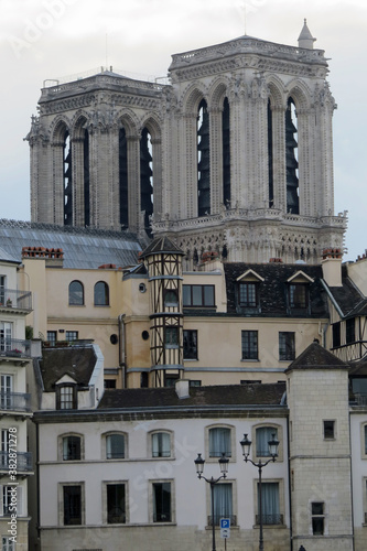 Backyard view of the towers of Notre Dame in Paris, France, Europe, behind residential houses