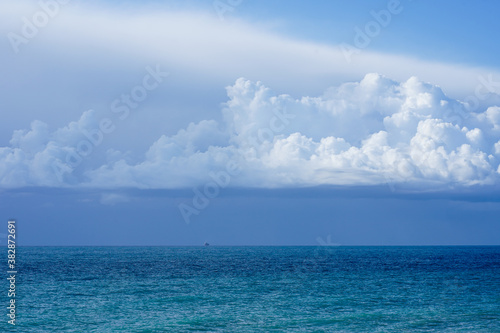 blue sky with clouds over the sea