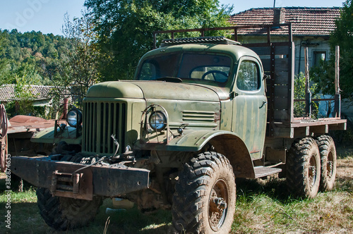 Old rusty soviet vintage heavy big truck closeup