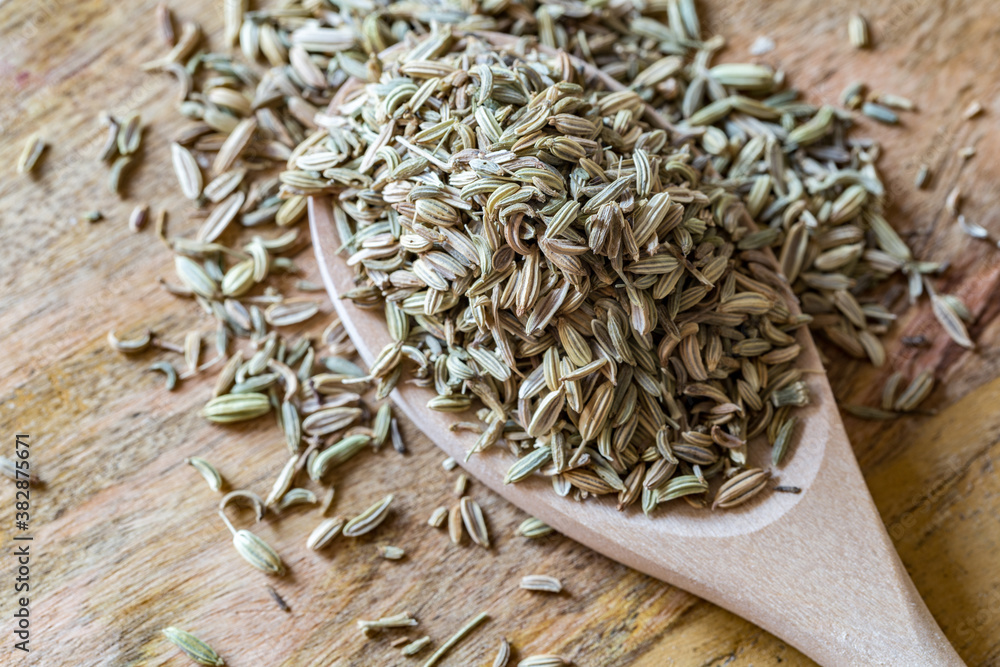 fennel seed in the wooden spoon