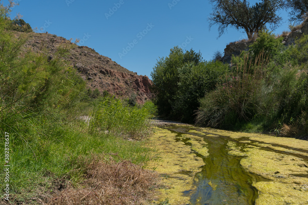 water flowing down a river in southern Spain water flowing down a river in southern Spain
