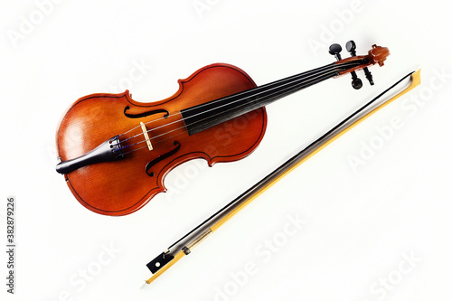 Violin on white background. Musical instrument. Classical music.