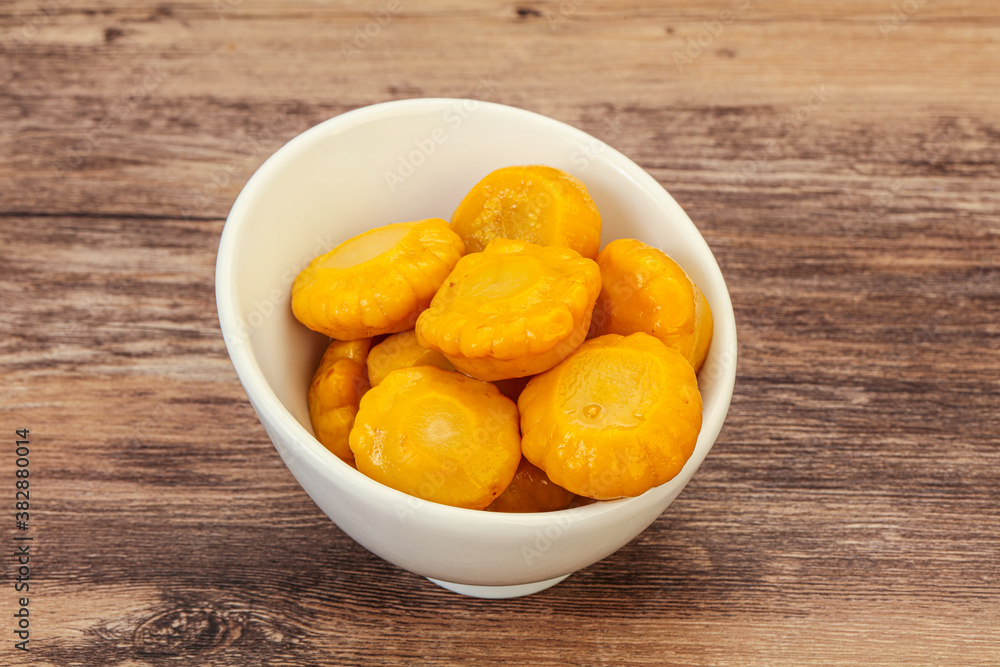 Marinated yellow patisson in the bowl