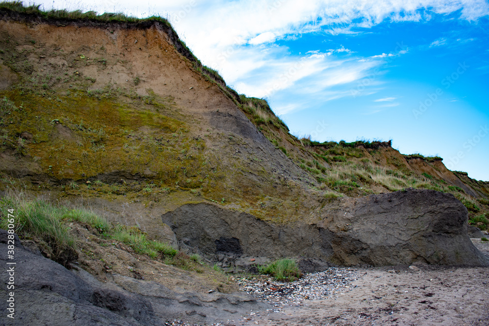 Fototapeta premium Nature background. Soft focus of geological structure, landslide on steep coastal cliffs 