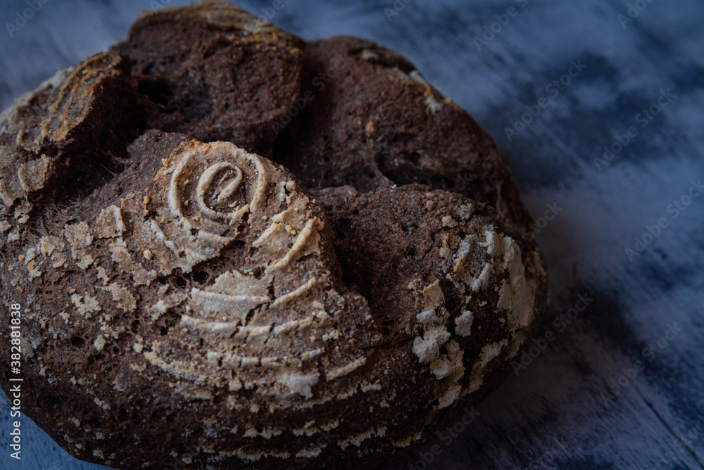 Closeup shot of freshly gluten free baked homemade sourdough bread on the table Closeup shot of freshly gluten free baked homemade sourdough bread on the table
