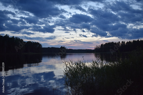Fototapeta Naklejka Na Ścianę i Meble -  blue sunset over the lake

