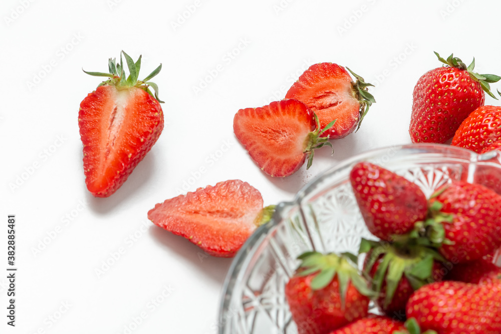 Fresh strawberry in ceramic jar on white Fresh strawberry in ceramic jar on white