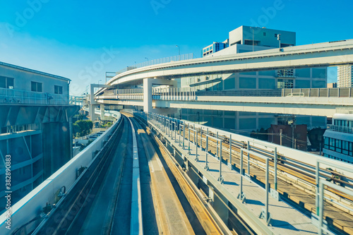 Transport system of Japan. Multilevel rail and road tracks. Passenger transportation. Transport infrastructure. High-speed roads. Urban landscape.