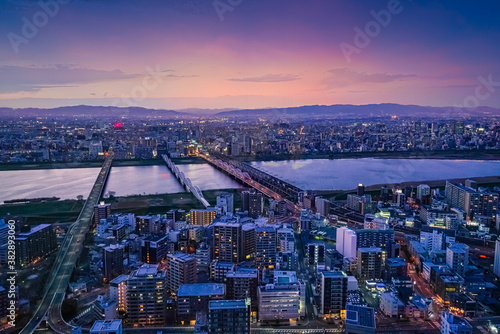 Osaka city and river from above at night