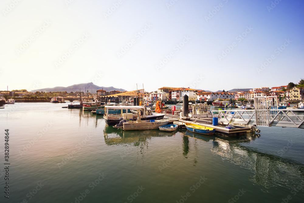 Saint Jean de Luz fishing port and marina in the Basque Country with mountain la Rhune in background