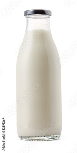 Closed glass milk bottle isolated on white background