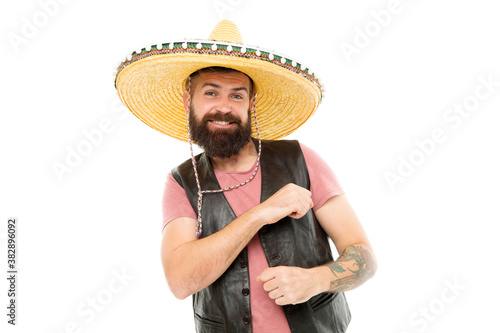 Mexican party concept. Celebrate traditional mexican holiday. Guy happy cheerful festive outfit ready to celebrate. Mexican melody drives him. Man bearded cheerful guy wear sombrero mexican hat