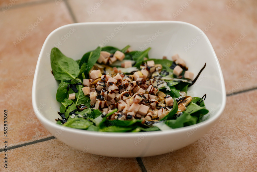 Top view of spinach, mushroom and ham salad Top view of spinach, mushroom and ham salad