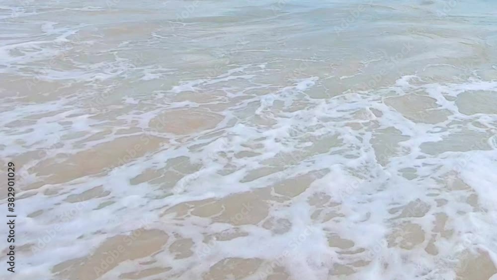 Tropical Pacific sea waves splashing on sandy beach at Paradise Island Oahu on Hawaii. Tropical Pacific sea waves splashing on sandy beach at Paradise Island Oahu on Hawaii.