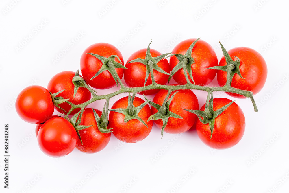 Fresh organic red tomatoes isolated on the background Fresh organic red tomatoes isolated on the background