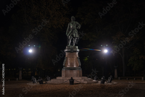 Autumn night photo of the monument to Peter the Great in Petrovsky Park.