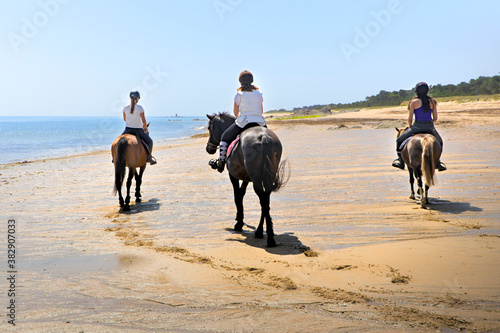 Fototapeta Naklejka Na Ścianę i Meble -  Horse riding on beach