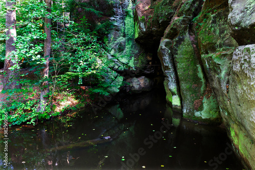 Wild summer Landscape around the Creek with Boulders and Rock in the Czech Switzerland, Czech Republic © Kajano