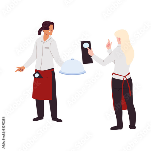 Waitress and waiter in uniform in restaurant