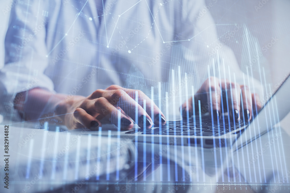 Double exposure of woman hands typing on computer and forex chart hologram drawing. Stock market invest concept. Double exposure of woman hands typing on computer and forex chart hologram drawing. Stock market invest concept.