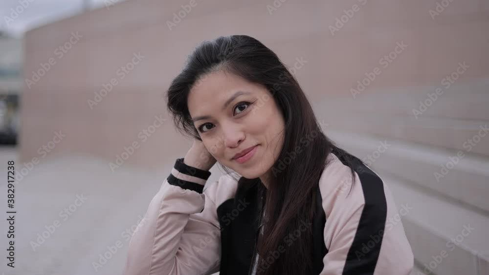Young Asian woman in a city - people photography Young Asian woman in a city - people photography