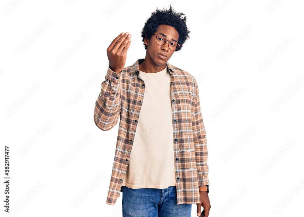 Handsome african american man with afro hair wearing casual clothes and glasses doing italian gesture with hand and fingers confident expression Handsome african american man with afro hair wearing casual clothes and glasses doing italian gesture with hand and fingers confident expression