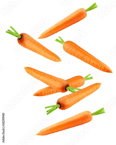 Falling carrot isolated on white background, clipping path, full depth of field