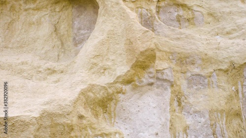 Sandstone surface damaged by the wind photo