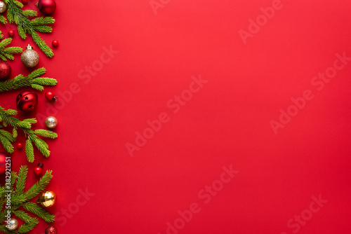 Christmas or New Year red background with fir border