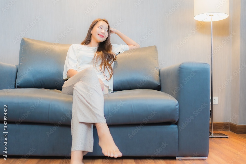 Portrait beautiful young asian woman relax on sofa in living room Portrait beautiful young asian woman relax on sofa in living room