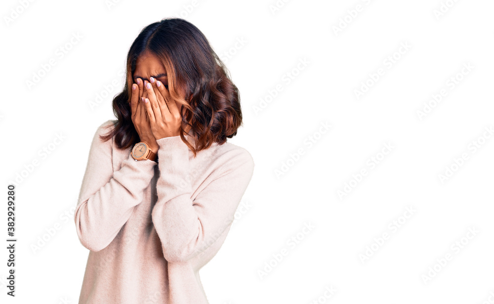 Young beautiful mixed race woman wearing winter turtleneck sweater rubbing eyes for fatigue and headache, sleepy and tired expression. vision problem Young beautiful mixed race woman wearing winter turtleneck sweater rubbing eyes for fatigue and headache, sleepy and tired expression. vision problem