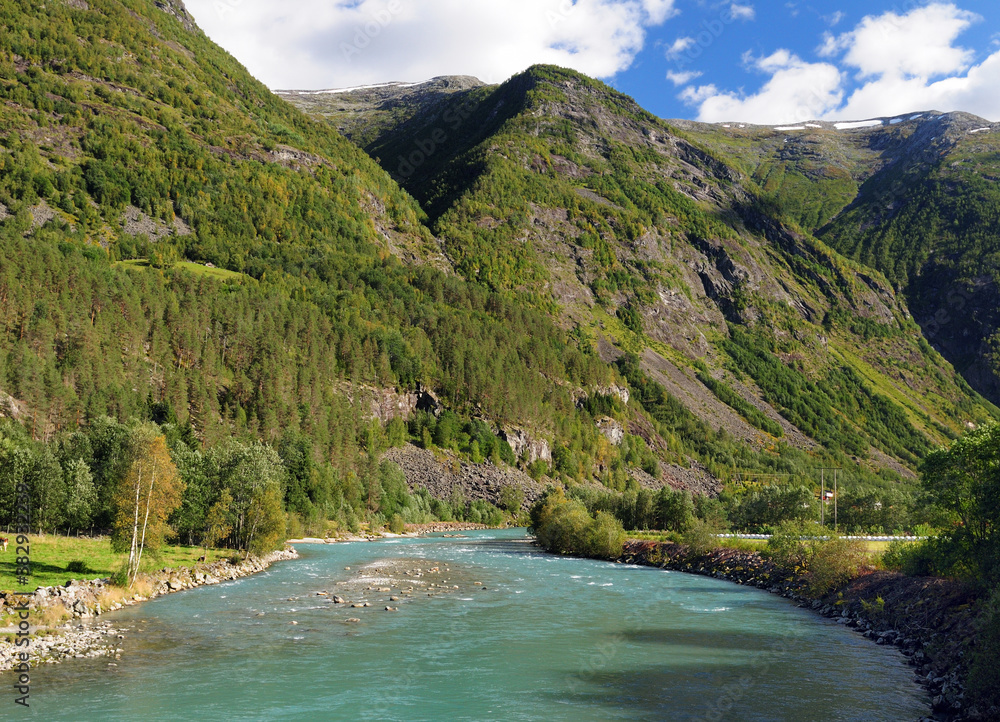 Beautiful Wild River Jostedola In Jostedalsbreen National Park On A Sunny Summer Day With A Clear Blue Sky And A Few Clouds