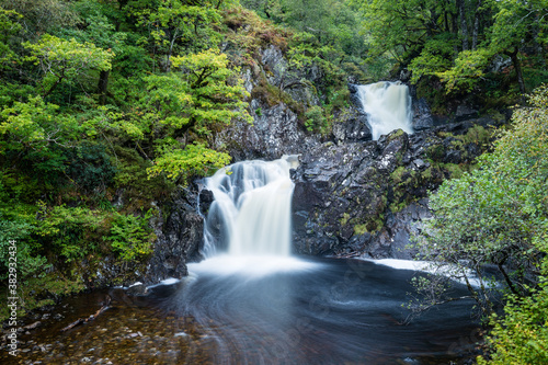 shot of Eas Chia-Aig waterfalls in Glen Chia-Aig near Achnacarry  Gairlochy and Fort William in the argyll region of the highlands of Scotland during autumn after heavy rainfall
