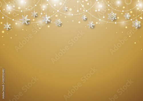 雪の結晶がぶら下がった キラキラ イルミネーションのクリスマス背景 フレーム　金