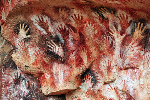 Paintings of hands, at the Cave of the Hands, an Ancient Cave Paintings in Patagonia 