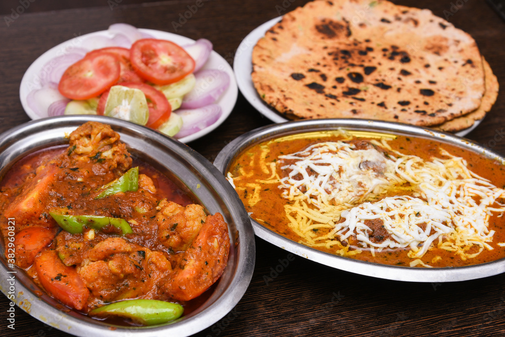 Indian flat bread tandoori roti and Malai kofta made in tandoor kitchen, Jaipur Rajasthan India. made from whole wheat Atta flour, baked on charcoal .