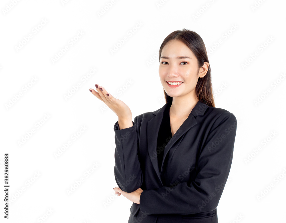 Portrait of young pretty Asian businesswomen in black suit presenting something with her hand. Portrait of young pretty Asian businesswomen in black suit presenting something with her hand.